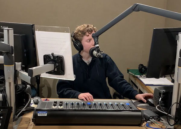 Sydney Wood in audio booth at IPM
