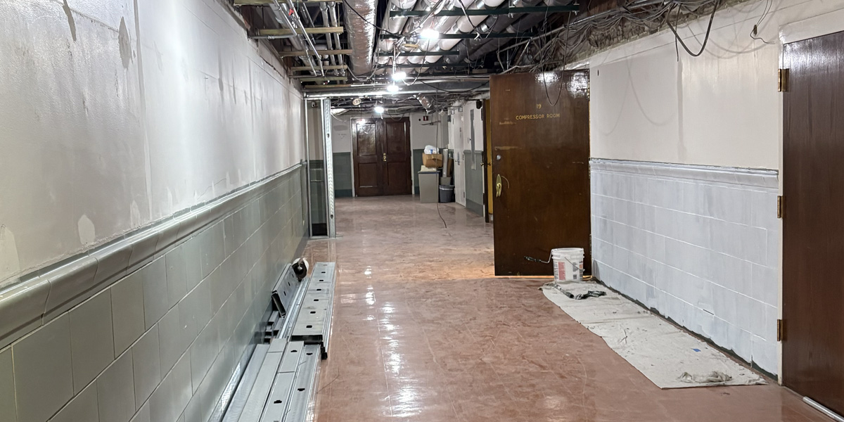 Gregory Hall lower level hall east painting and primer