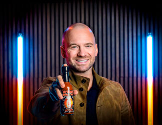 Sean Evans, host of "Hot Ones" and University of Illinois College of Media alum