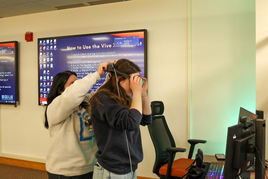 Students try on VR goggles
